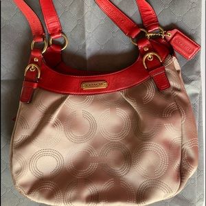 Tan and red leather Coach handbag